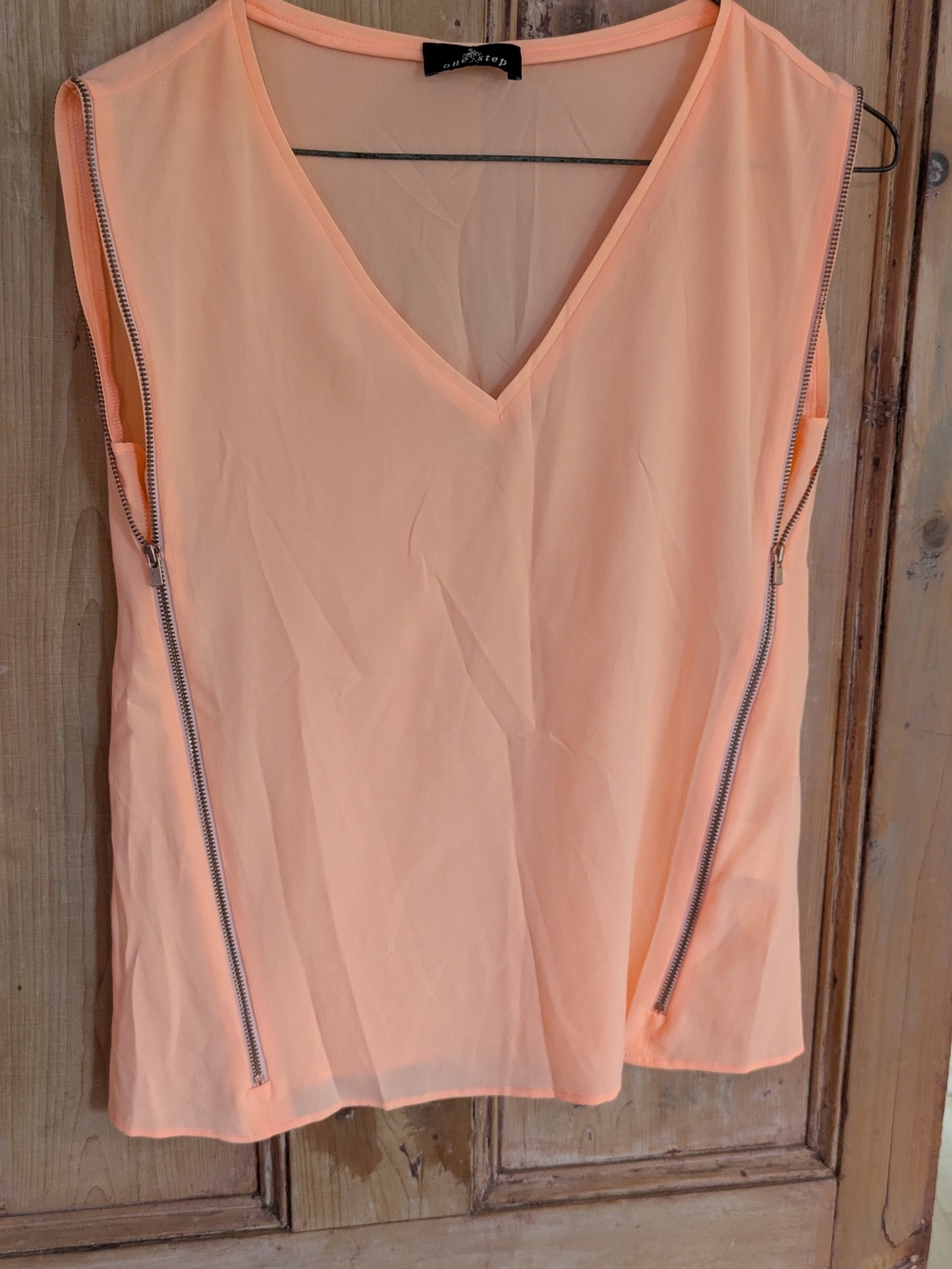One Step Ahead Peach Sleeveless V-Neck Top with Silver Zipper Detailing